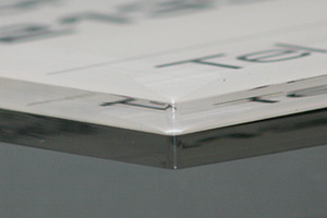 Cut edge of acrylic plate